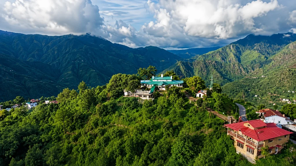 Green Kumaon hillside town featured in the multi hill station Uttarakhand tour packages