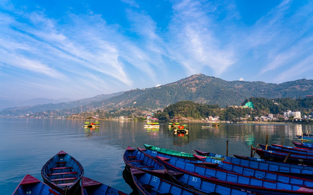 Naini lake framed by Kumaon hills, the family favourite in our Uttarakhand tour packages